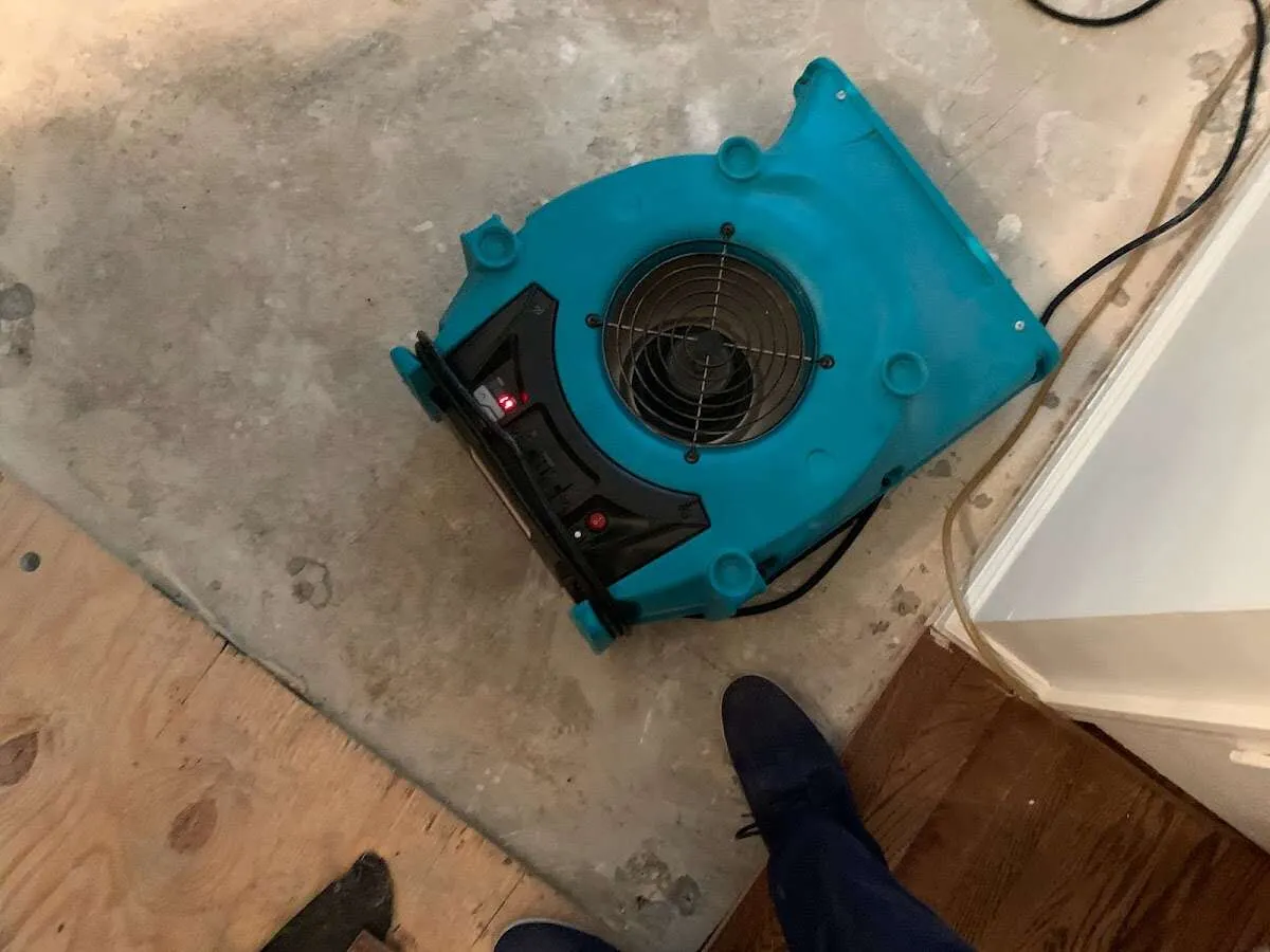 Air mover drying subfloor during Leak Detection & Repair in Breckenridge